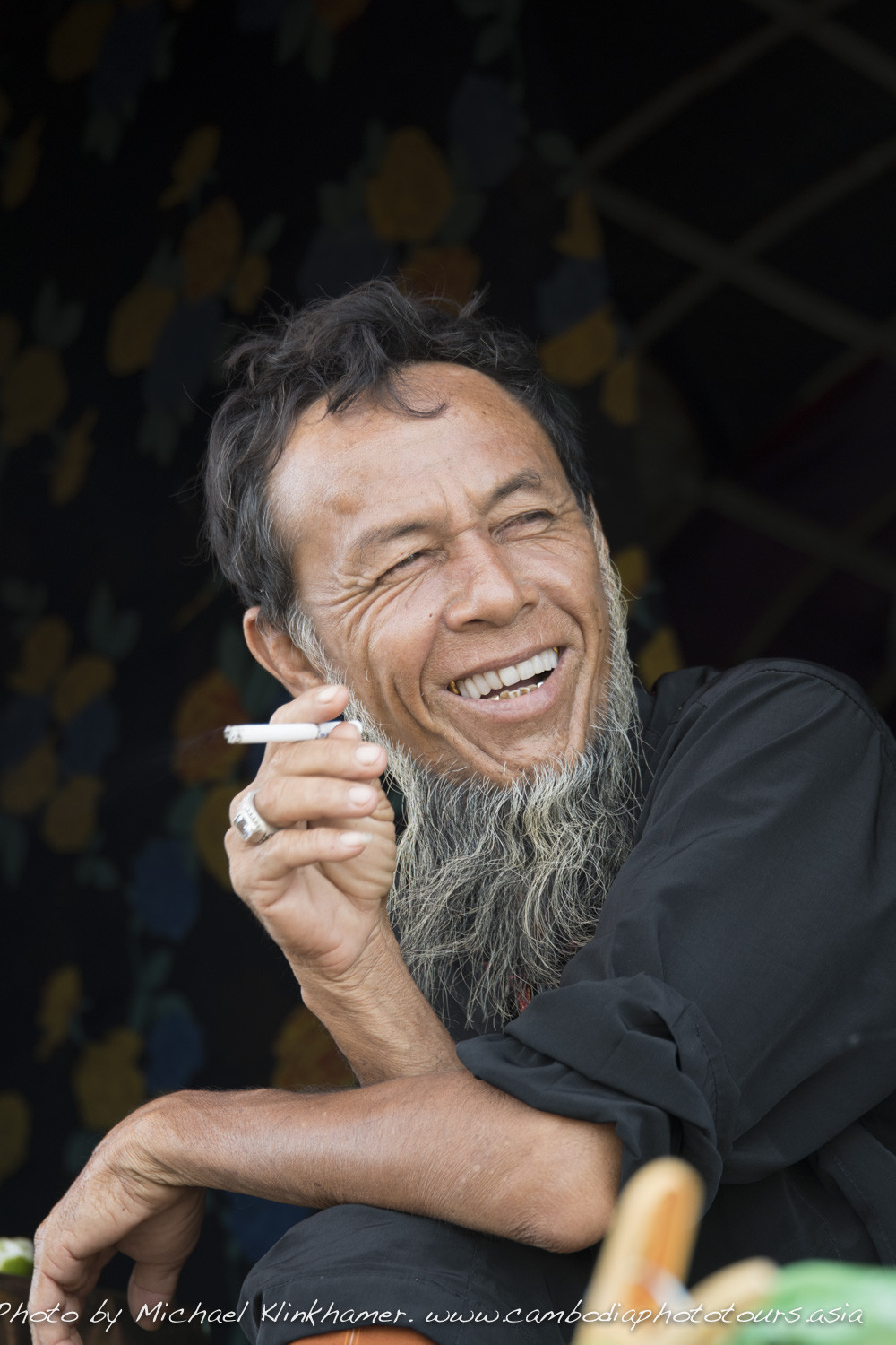 Cham man smoking cigarette